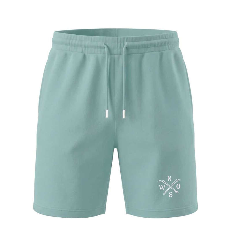 Wanderstöcke Stick | Unisex Organic Shorts in Teal Monstera von Rad&Rucksack