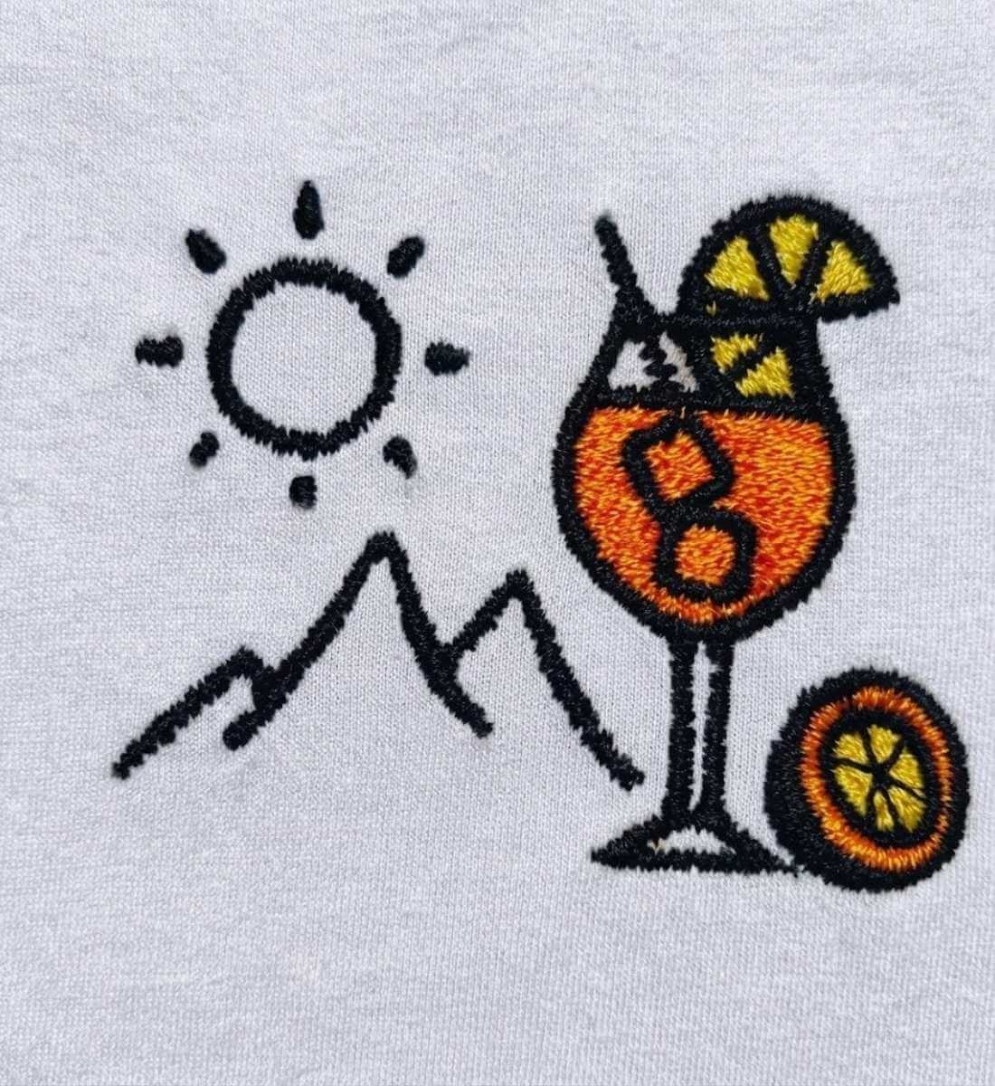 Aperol Sonne Berg Stick | Damen Premium Organic Poloshirt von Rad&Rucksack - Detailansicht